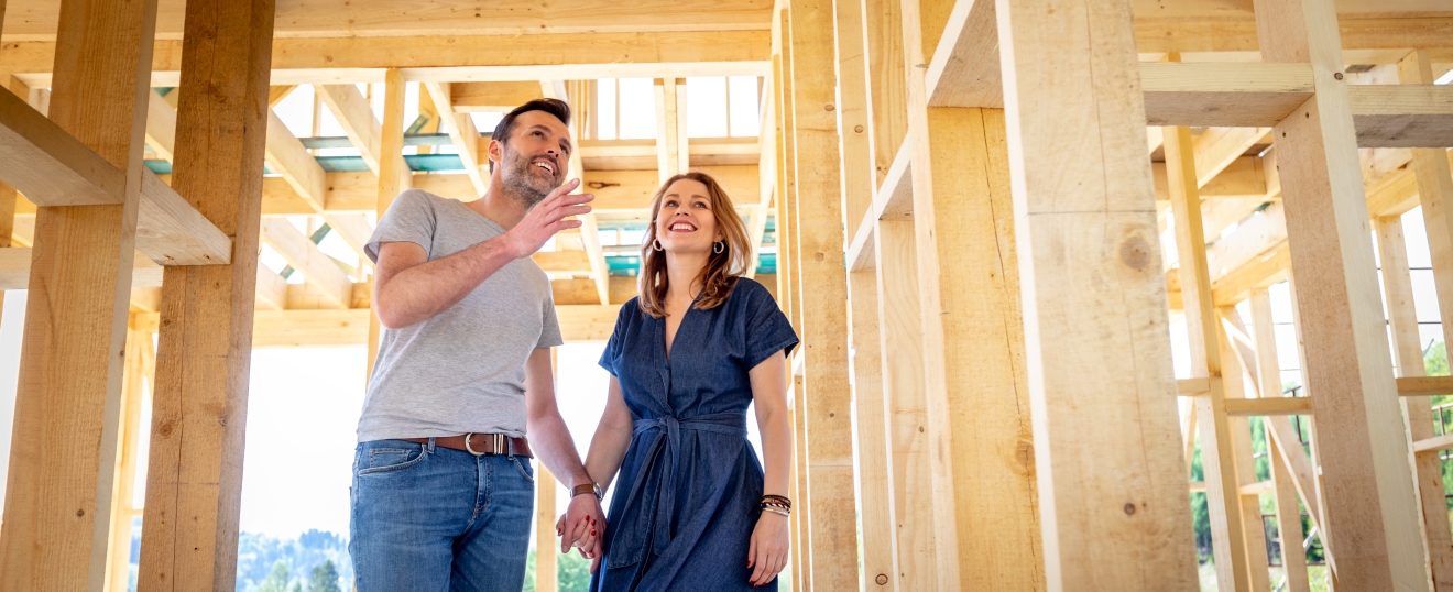 Happy Midlothian Homeowners walking through New Construction Home