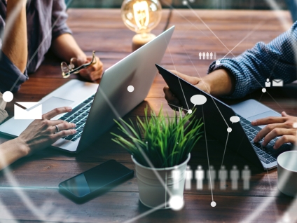 Laptops working at desks using Ubiquiti WiFi